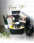 Gift basket with coffee and snacks, camera, and text 'Fuel Up! For the Adventures' on a light background.